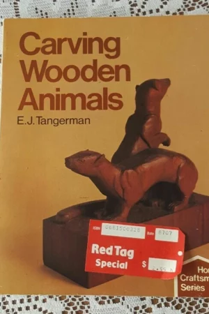 cover image carving wooden animals vintage 1984 paperback